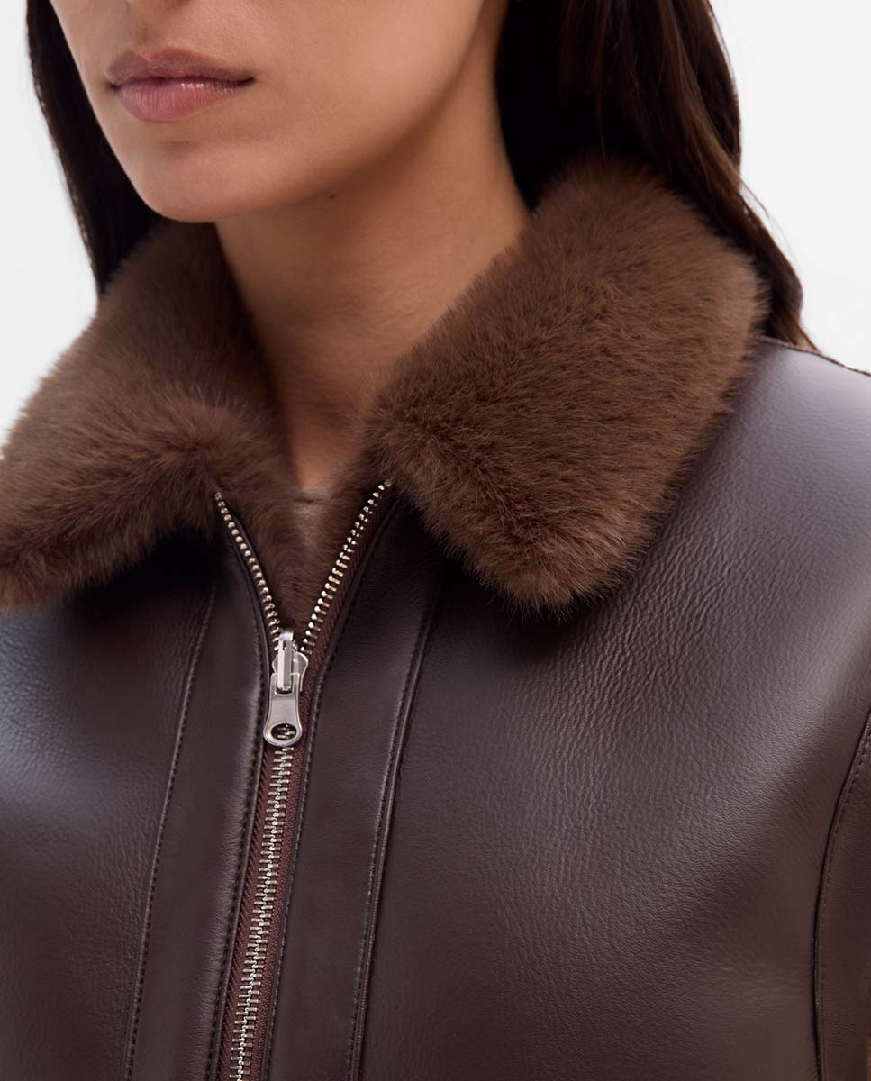 Chaleco corto reversible