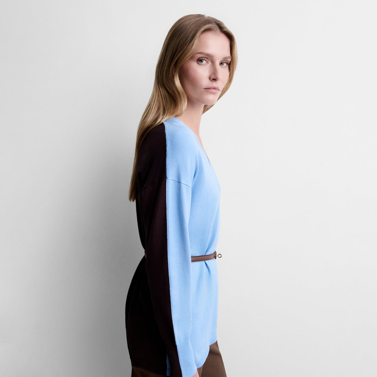 Two-tone sweater with belt