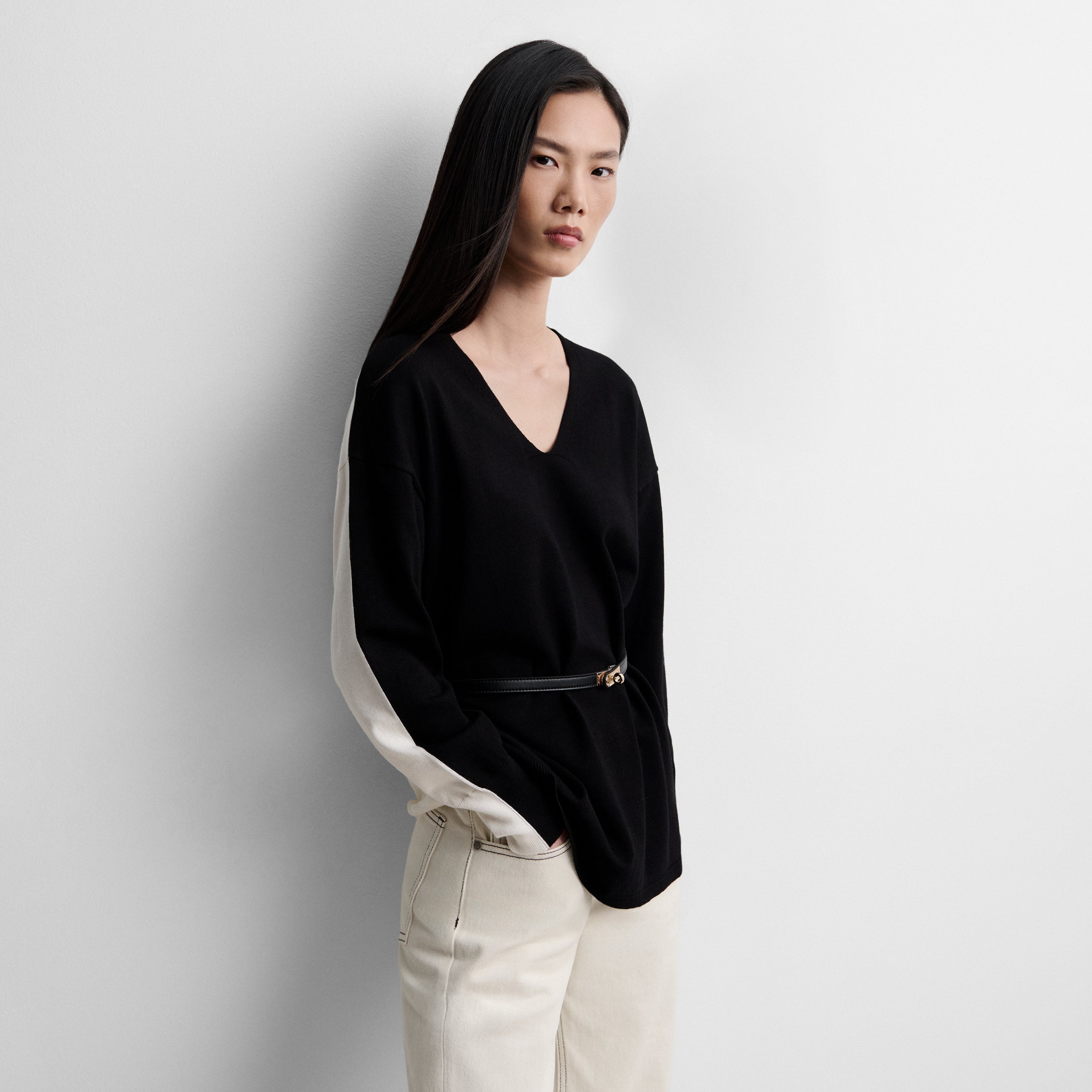 Two-tone sweater with belt