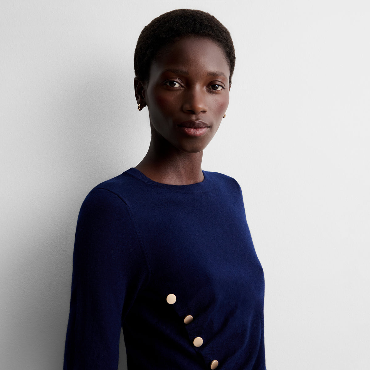 Draped sweater with buttons
