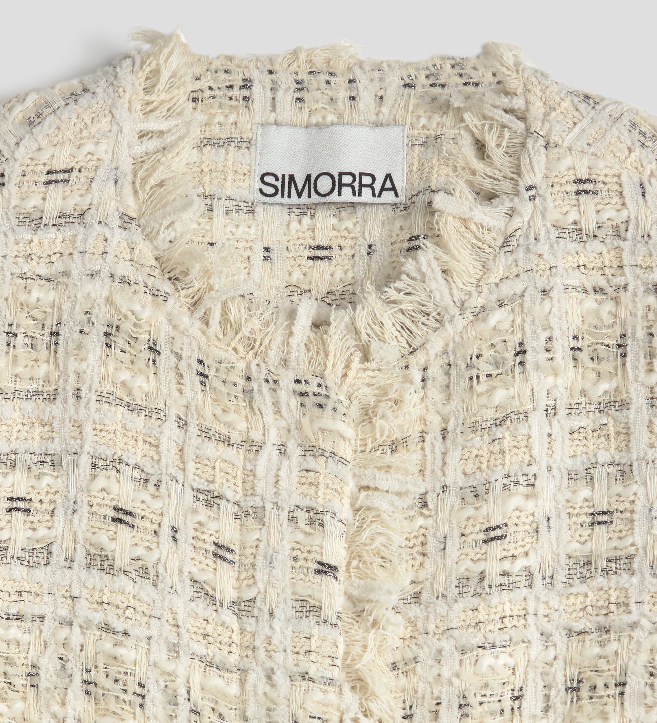 Chaqueta tweed flecos
