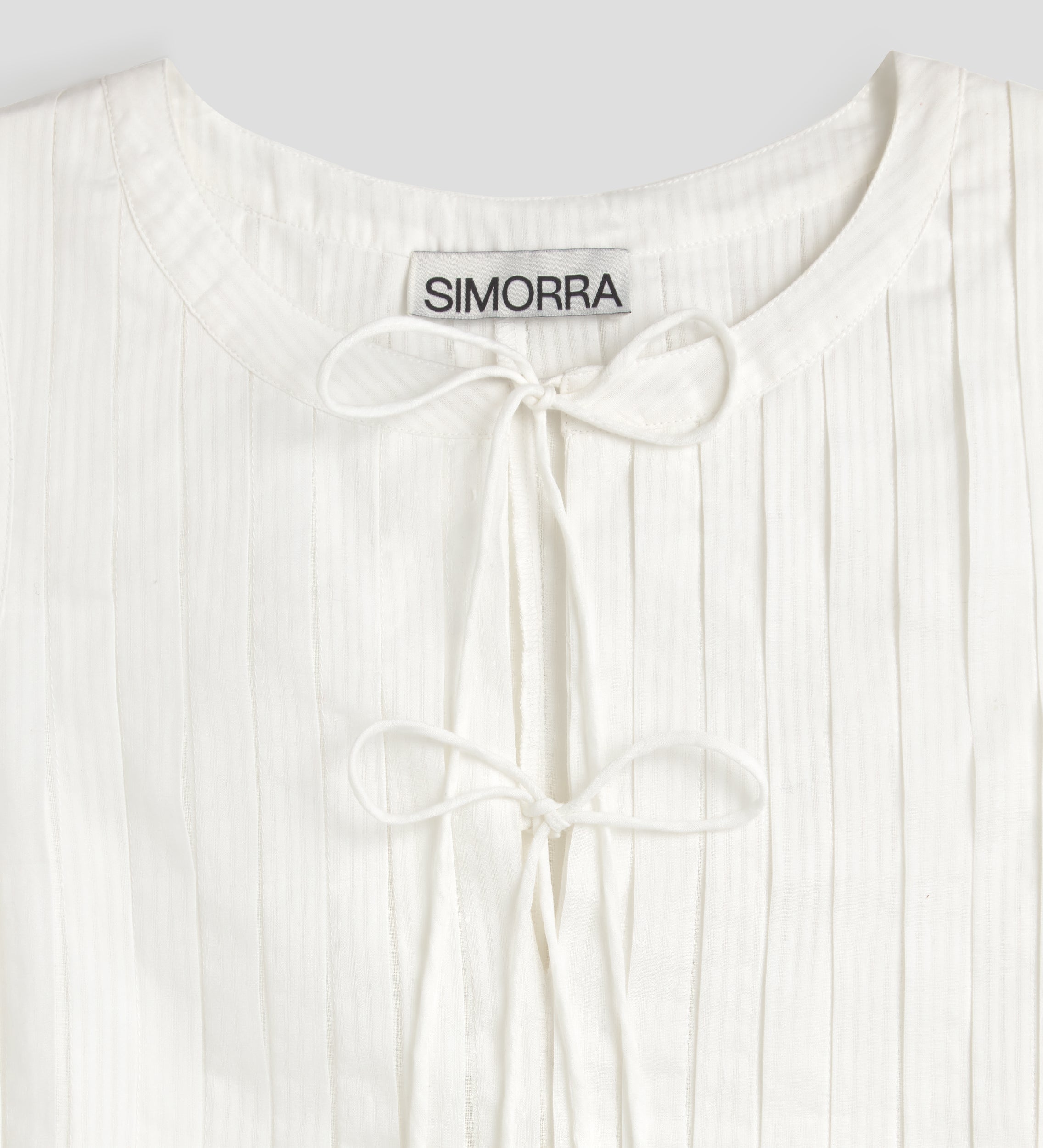 Top pleats bow