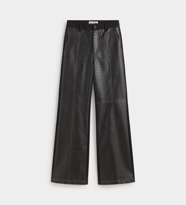 Two-material trousers with topstitching