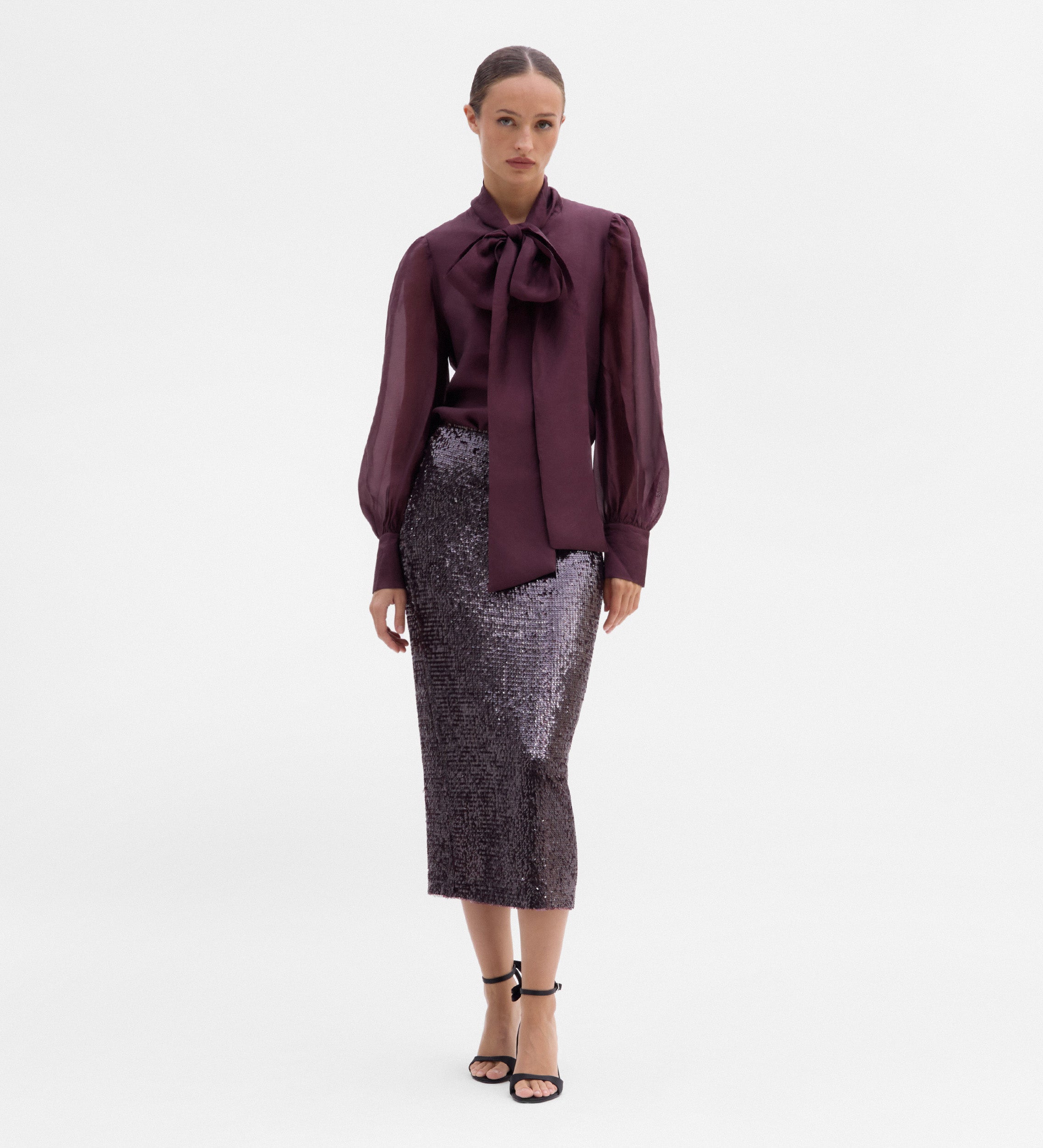 Blouse with a bow neck