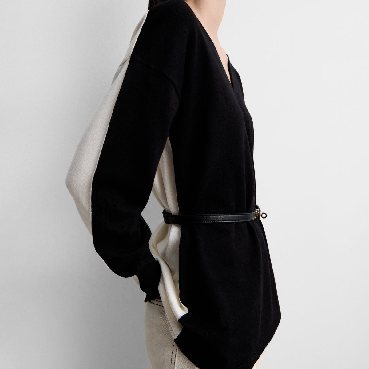 Two-tone sweater with belt
