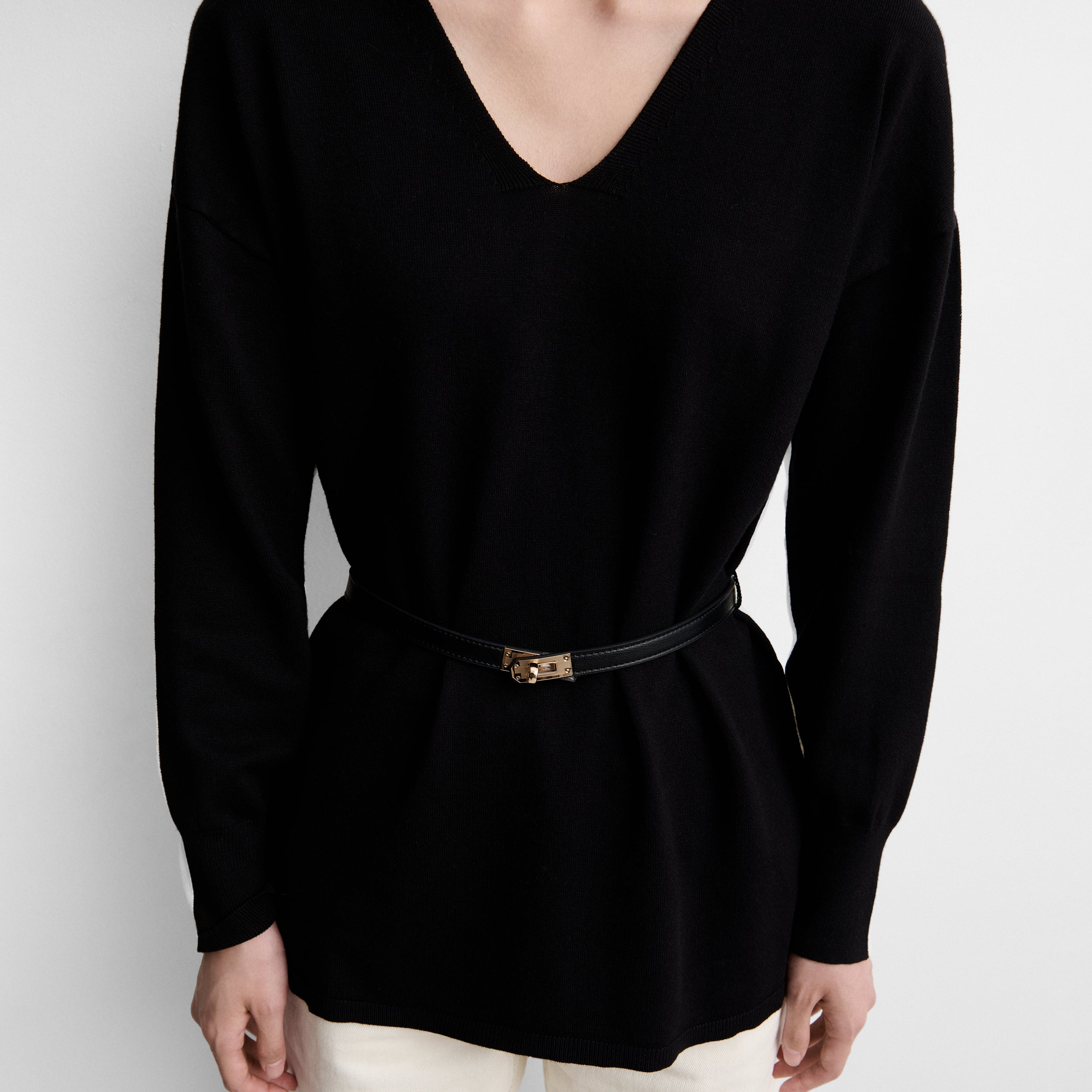 Two-tone sweater with belt