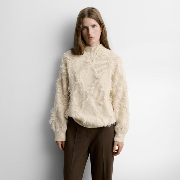 Fringed diamond-pattern sweater