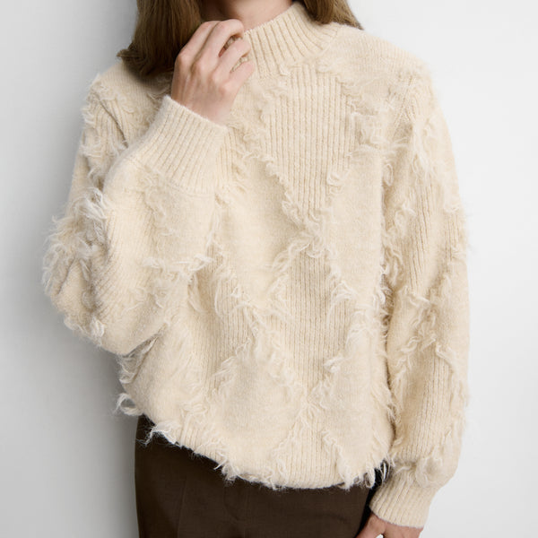 Fringed diamond-pattern sweater