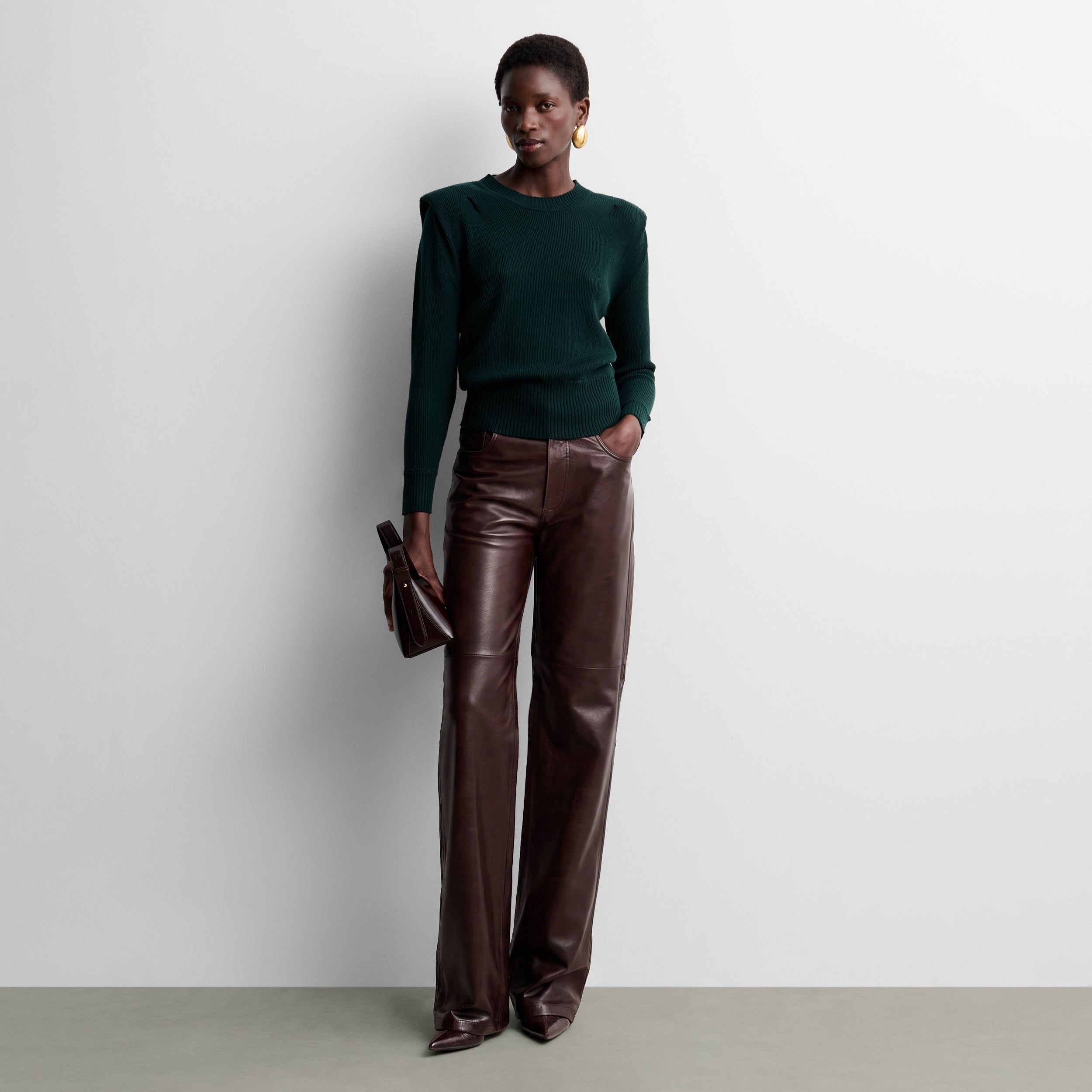 Knit sweater with shoulder pads