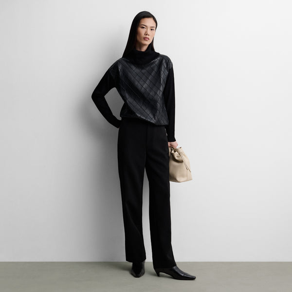 Two-material sweater with diamond pattern