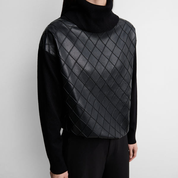 Two-material sweater with diamond pattern