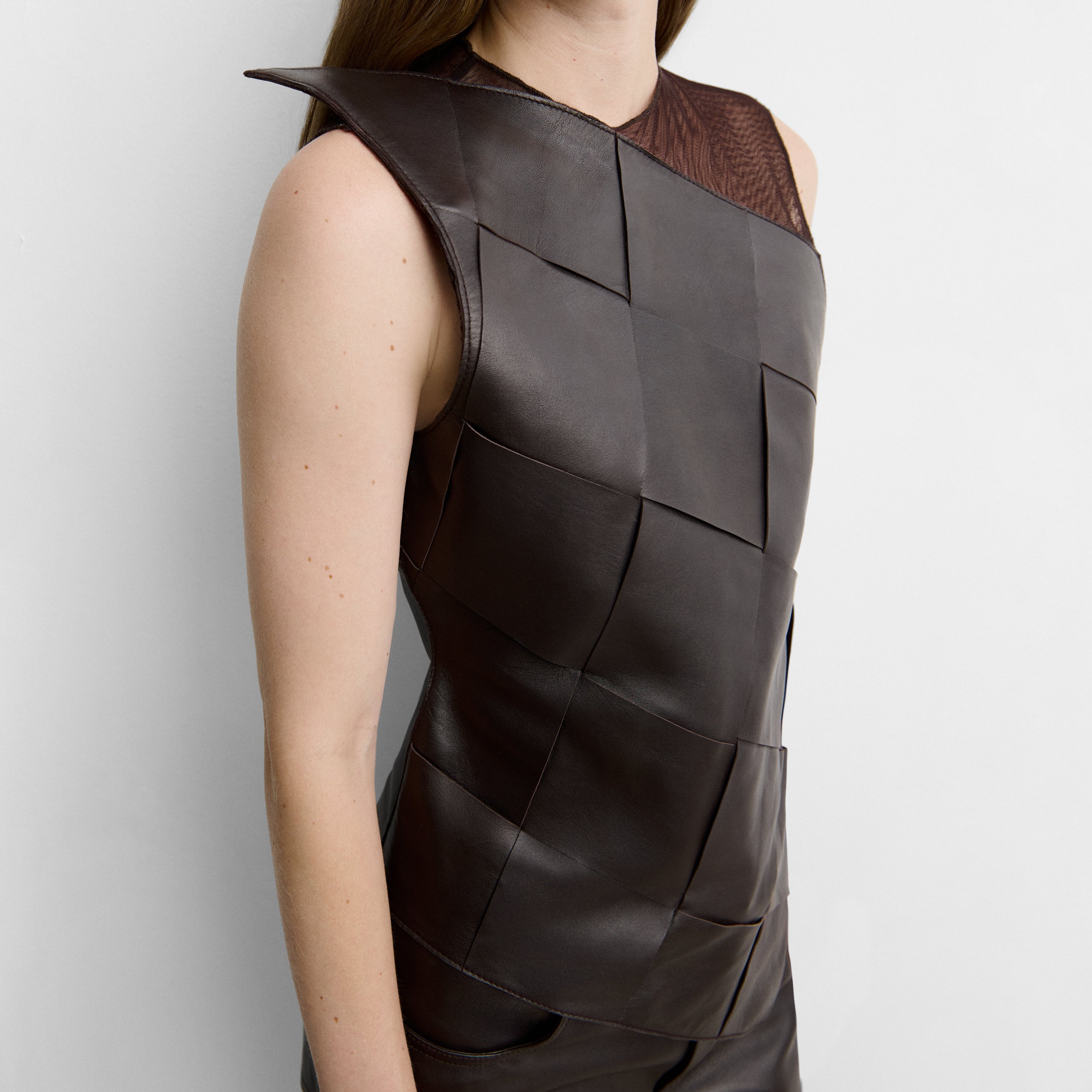 Woven leather top