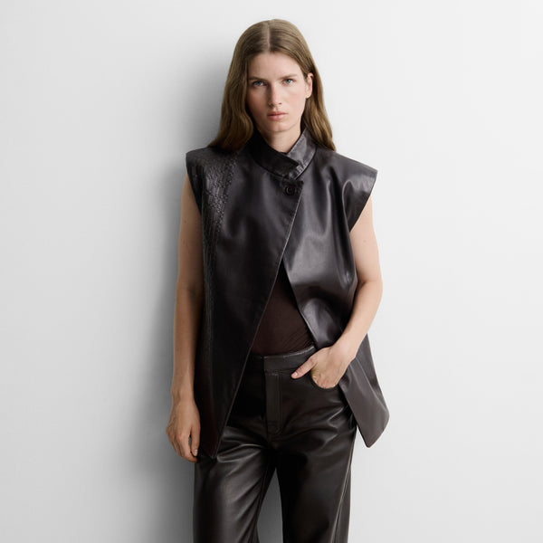 Faux leather gilet with woven straps