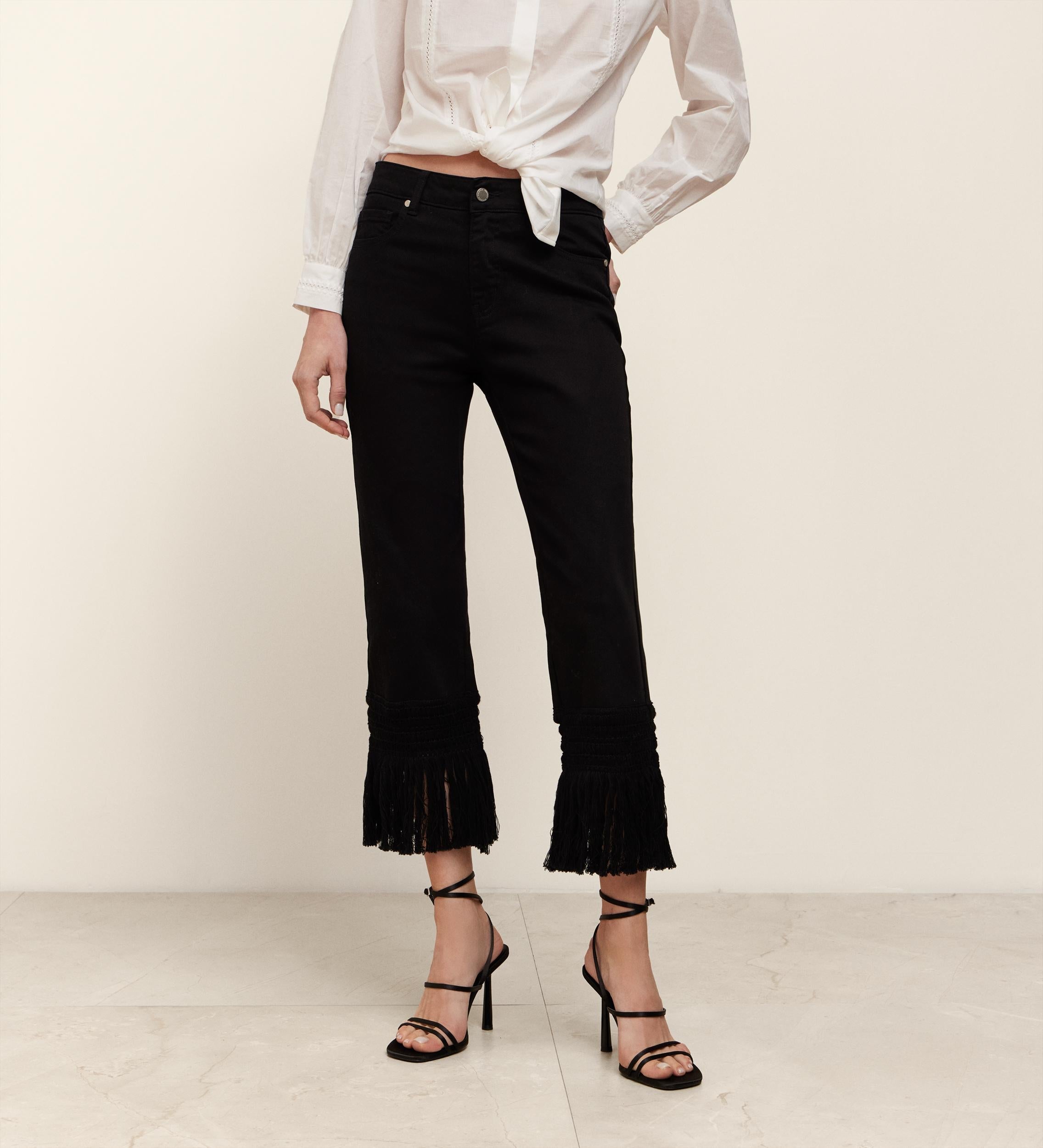 Low-rise trousers with fringes