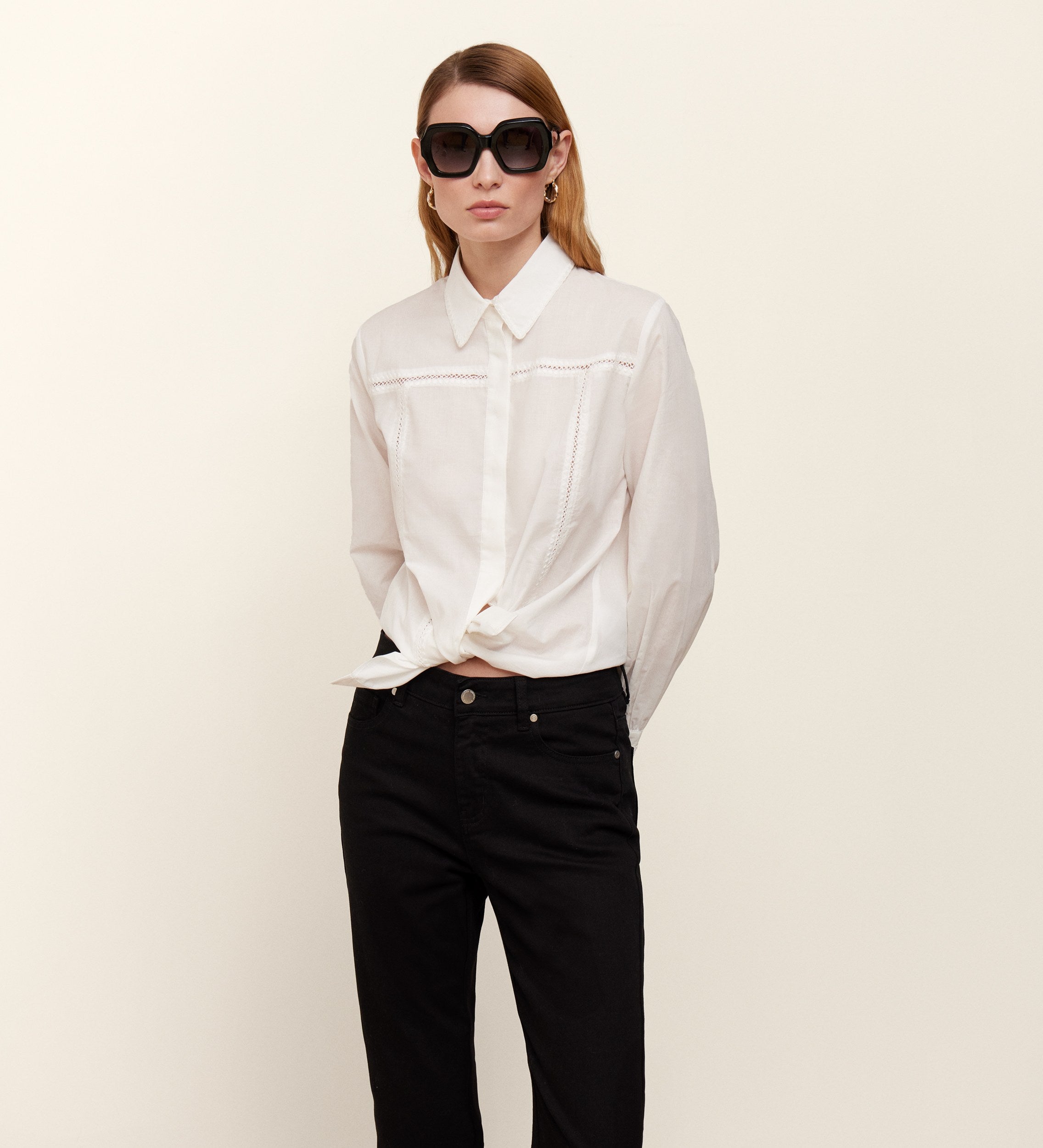 Low-rise trousers with fringes