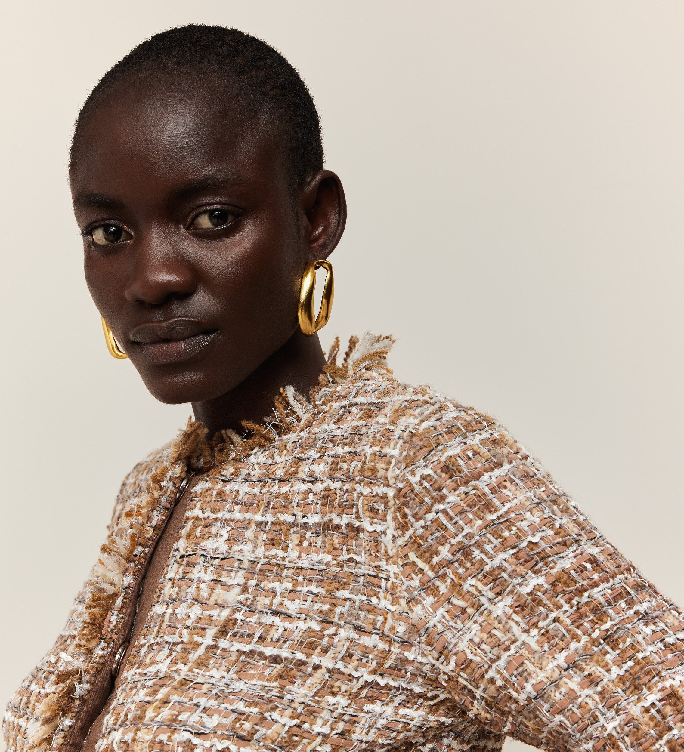 Chaqueta tweed flecos