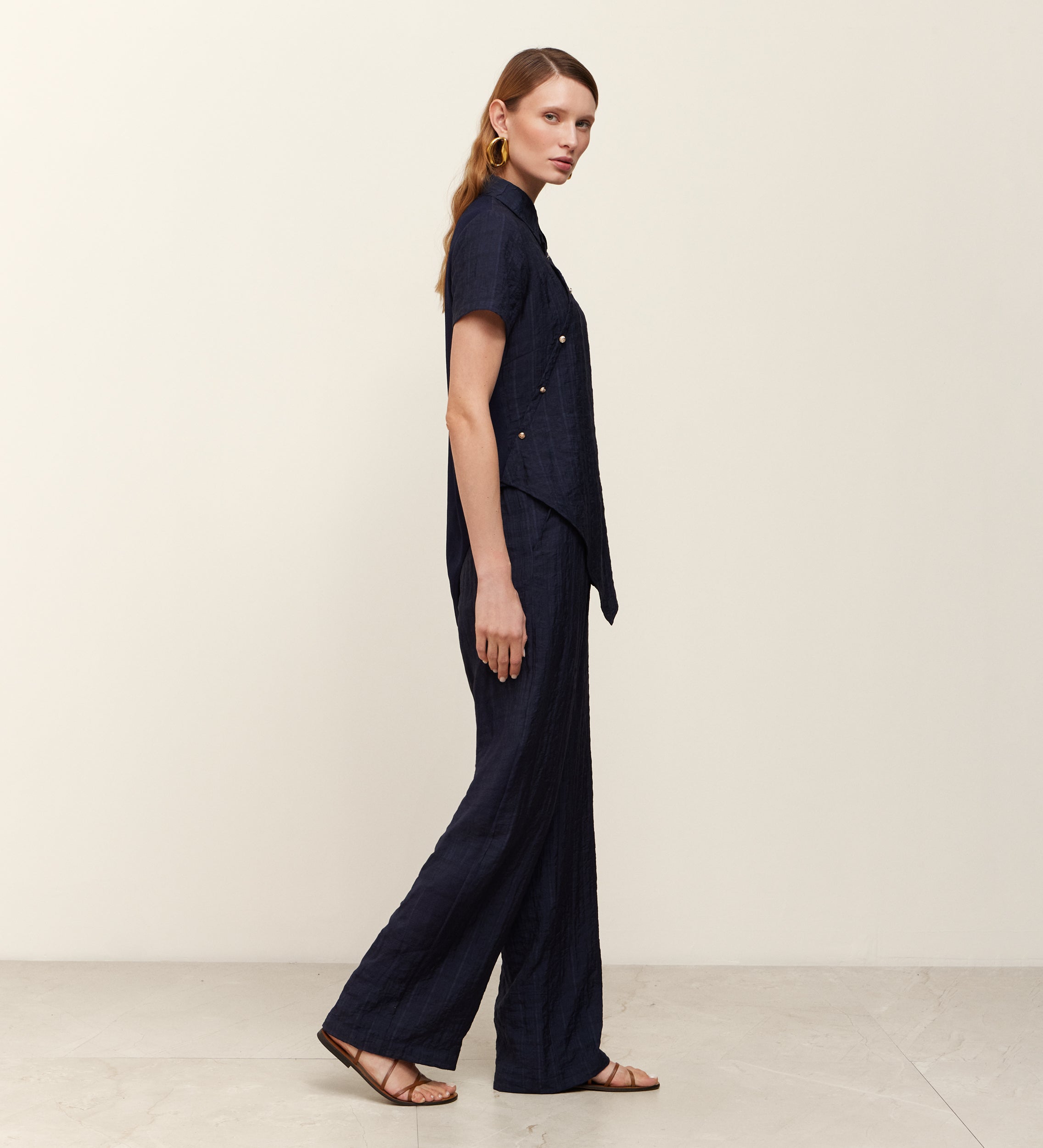 Asymmetrical bi-material knit top