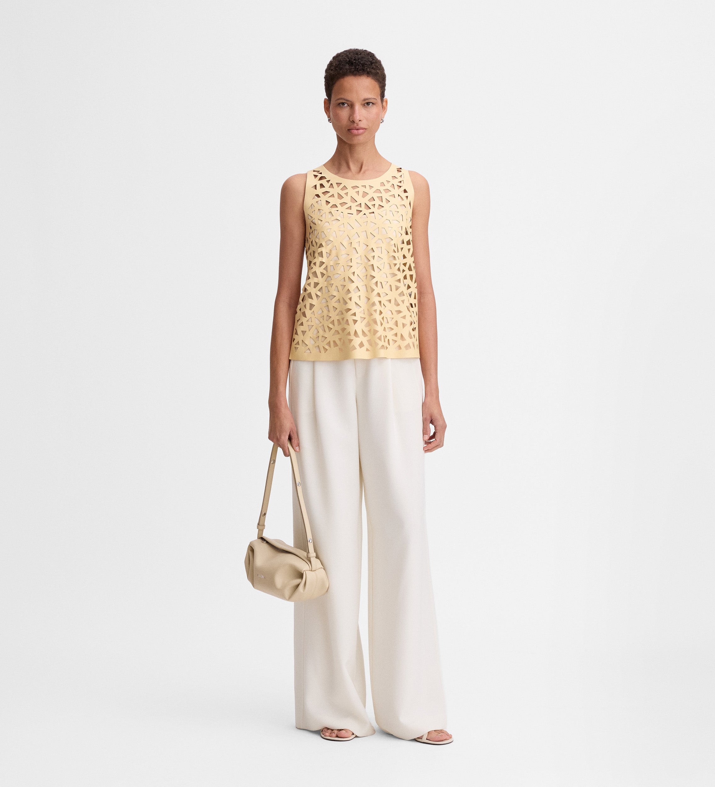 Perforated vegan leather top