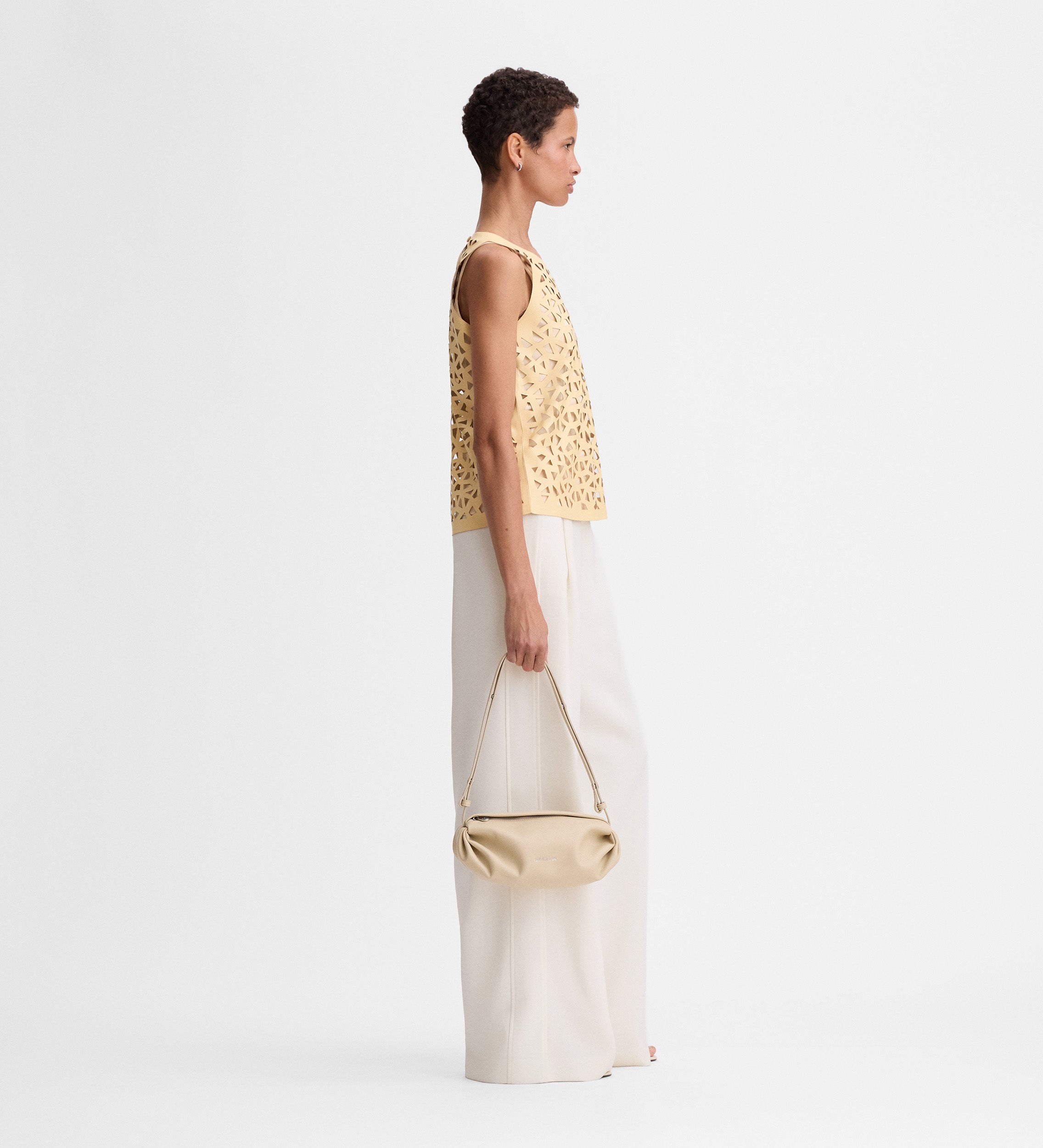 Perforated vegan leather top