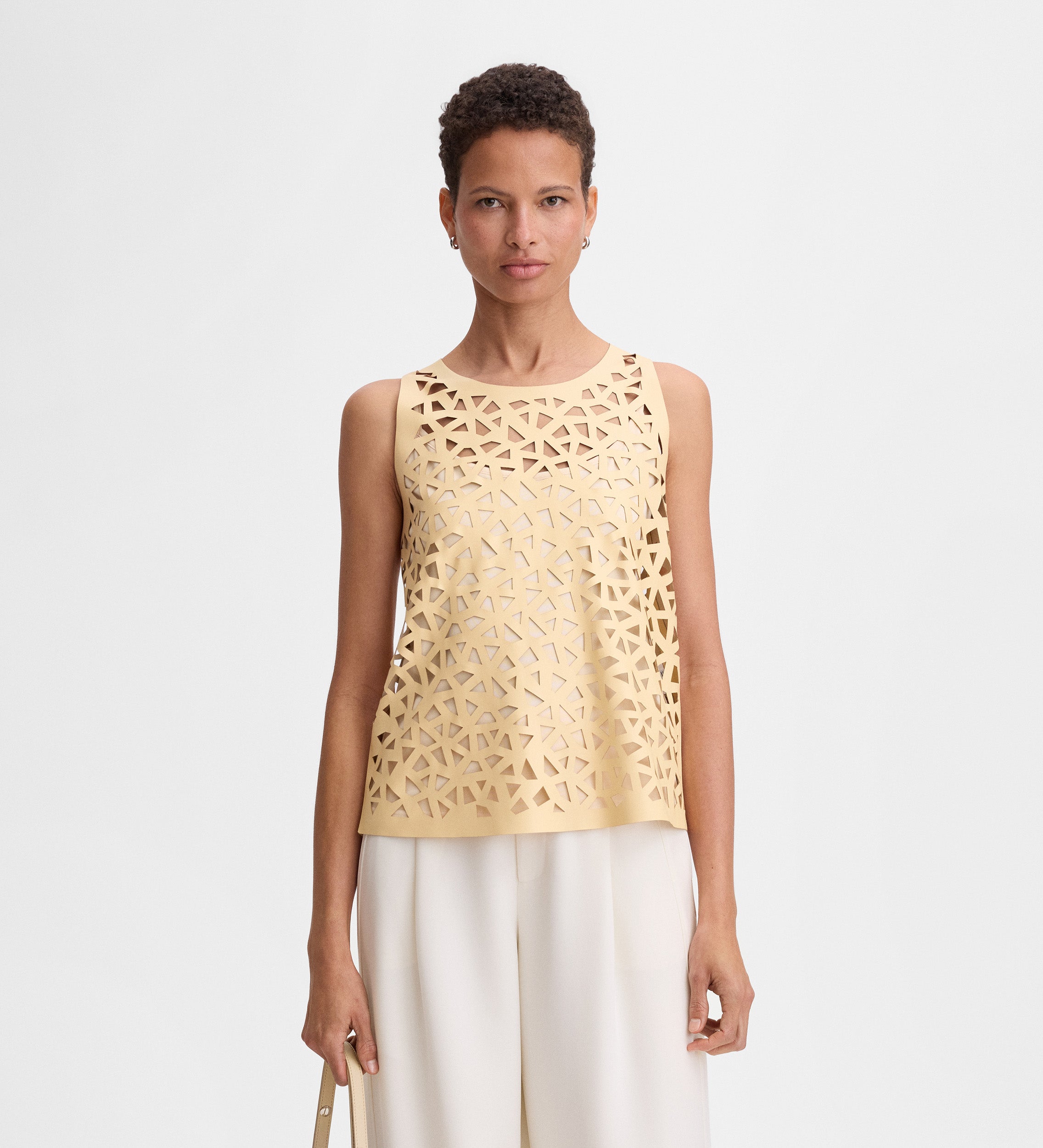 Perforated vegan leather top