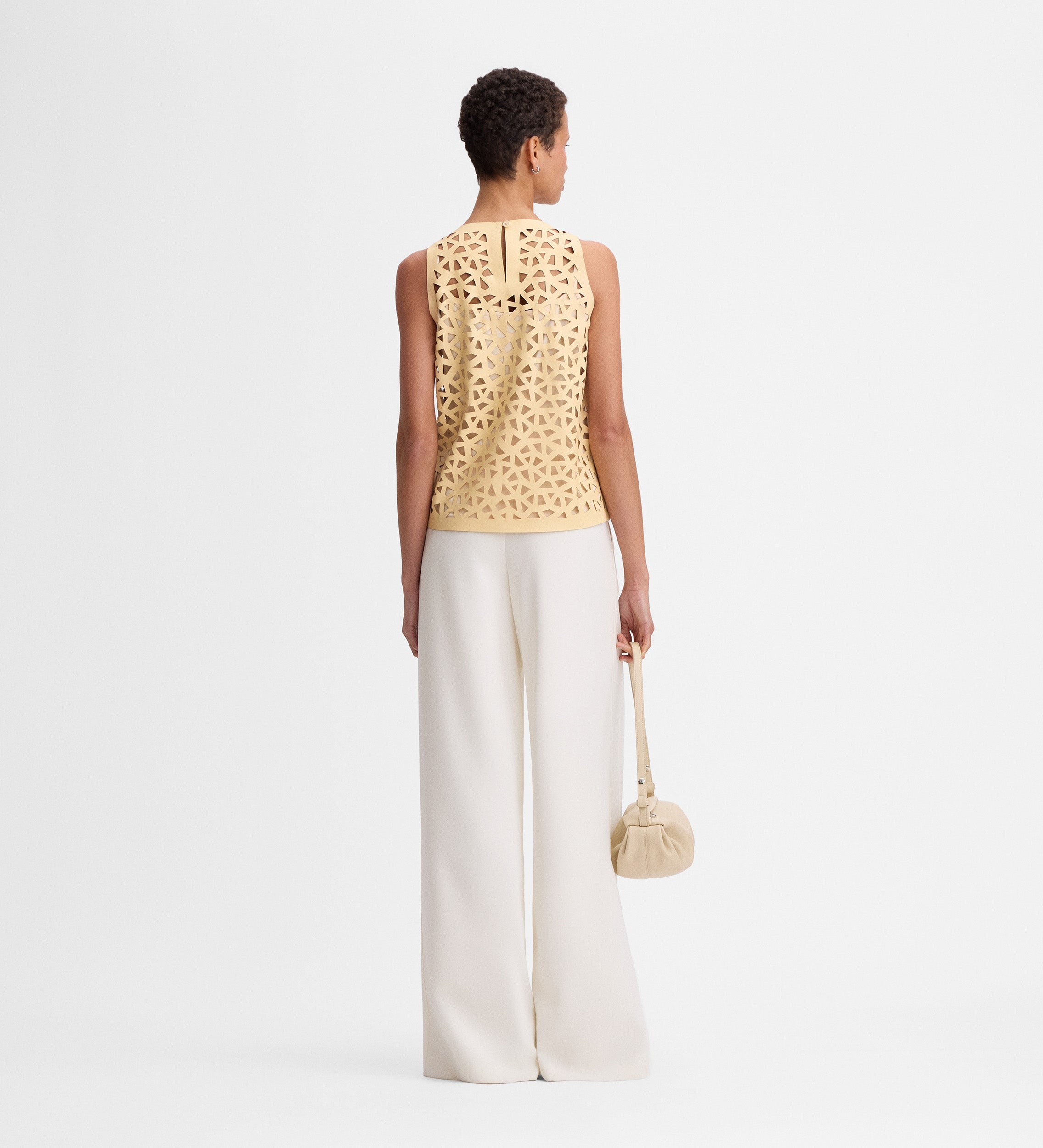 Perforated vegan leather top